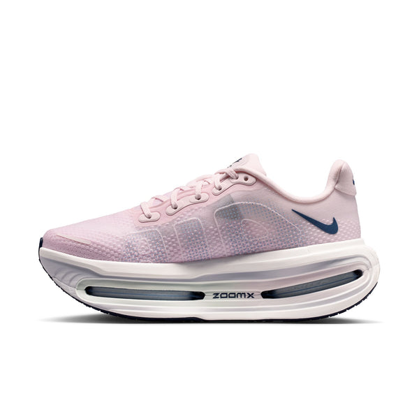 Pink running shoe with 'Zoomx' sole on a white background