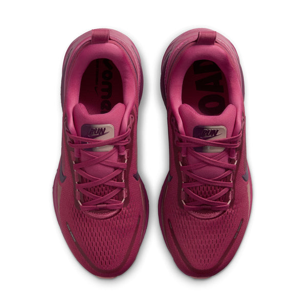 Pair of Vomero 18 women's running shoes from the top own angle showing the shape of the shoe.