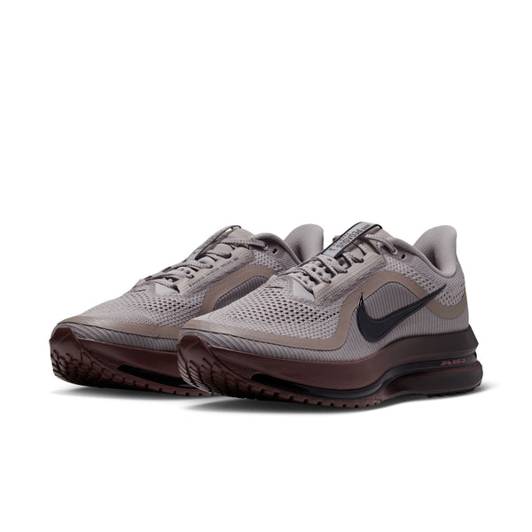A pair of Nike pegasus premium running shoes with full length air zoom.