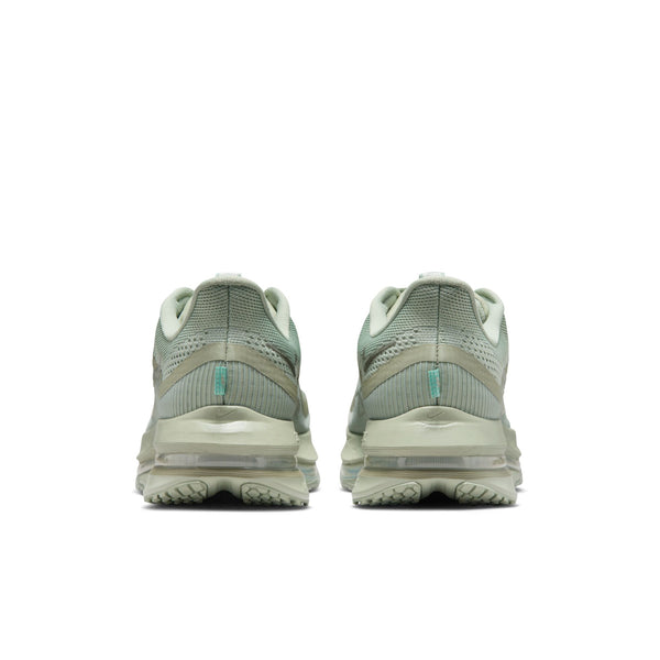Pair of light gray sneakers on a white background.