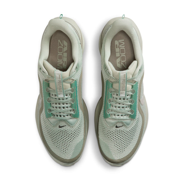 Pair of light gray and teal sneakers on a white background.