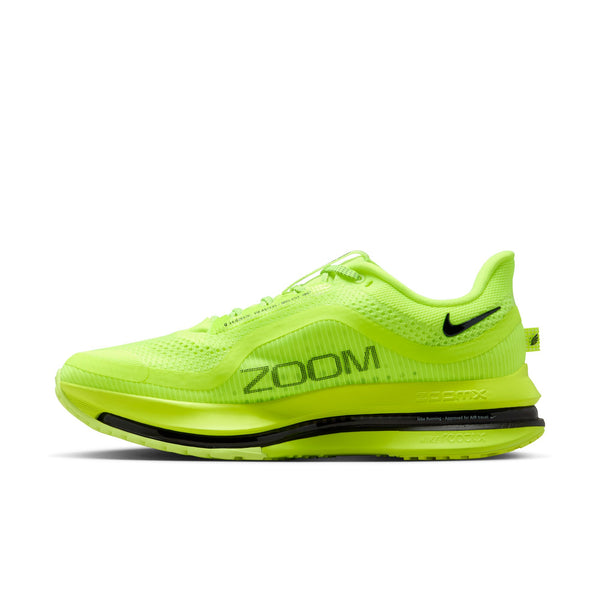 Bright green running shoe with 'Zoom' and Nike logo on a white background