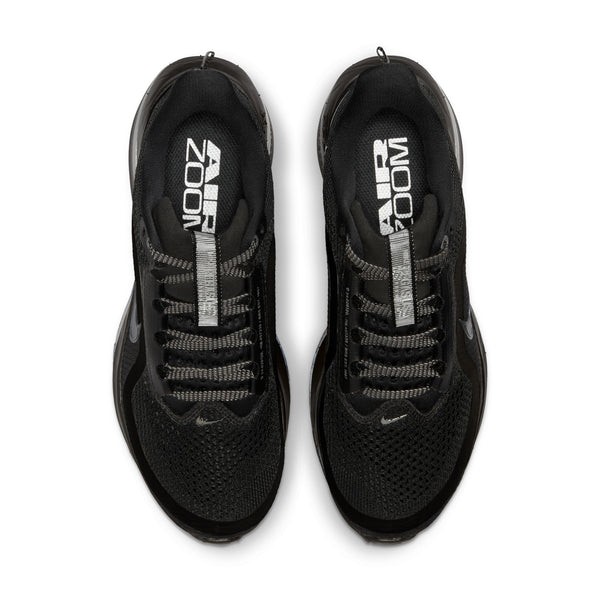A paiof Nike black athletic shoes from the top down view with 'Air Zoom' branding on a white background.