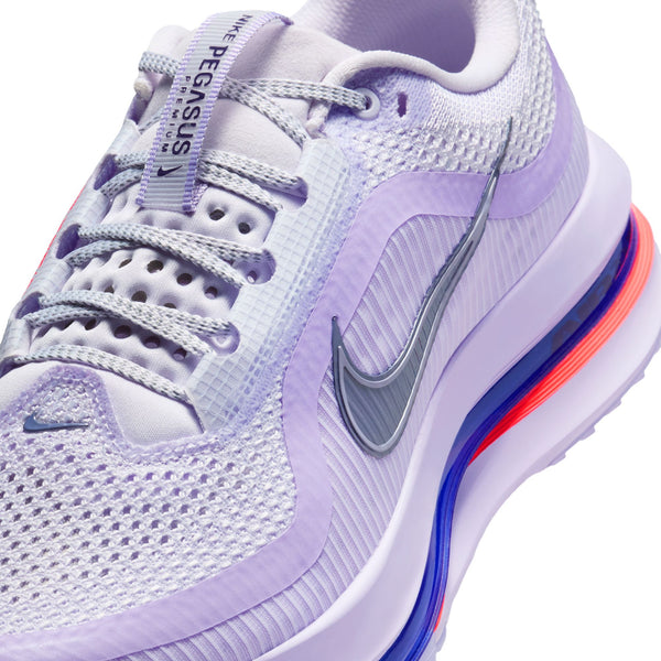 Purple running shoe with Nike logo on a white background