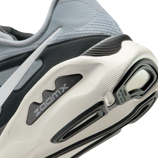 Close-up of a sneaker with 'zoomx' technology on a white background