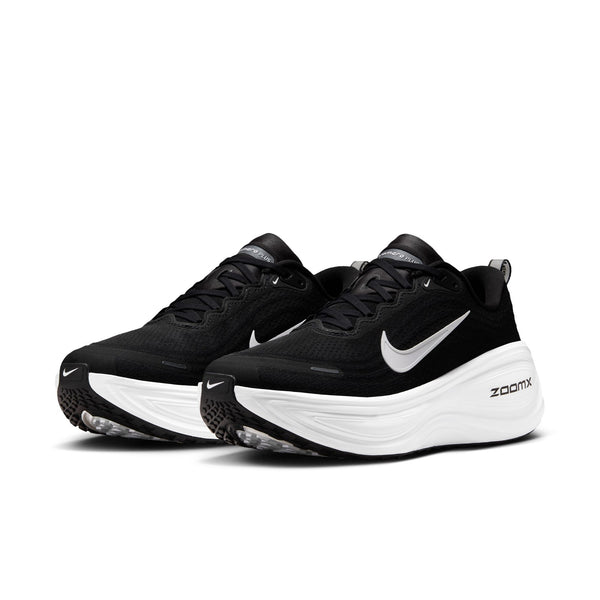 Black and white running shoes with Nike logo on a white background.