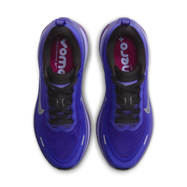 Black laces on a women's purple Nike running shoe.