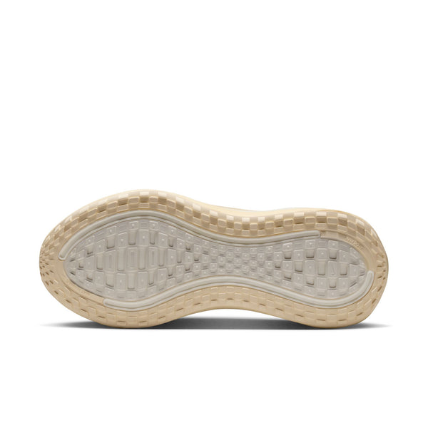 Close-up of a shoe sole with a textured pattern on a white background