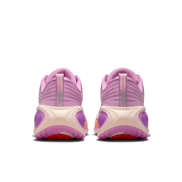 Pink and beige running shoes with a white background