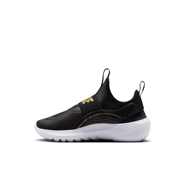 A black Nike sneaker with a white sole and gold accents, shown from the side against a plain white background.
