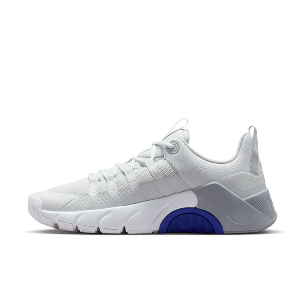 White sneaker with a blue sole on a white background