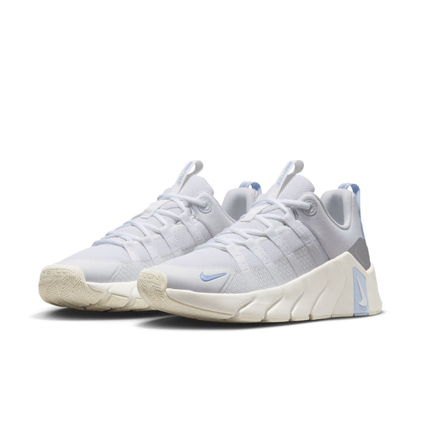White running shoes with pink accents on a white background