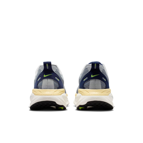 Pair of Nike sneakers shown from the back on a white background