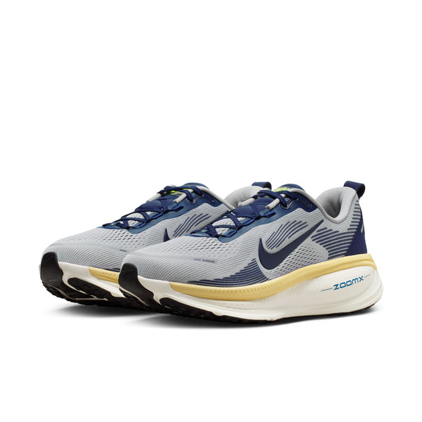 Gray and blue running shoes with Nike logo on a white background