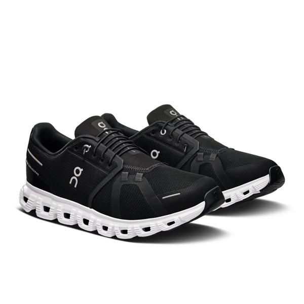 A pair of the black and white On Cloud 6, a classic shoe.