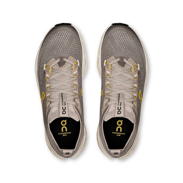 Pair of gray running shoes with visible 'On' branding on a white background.