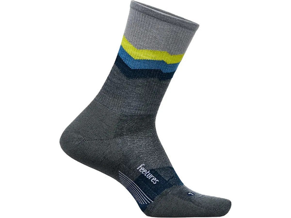 Gray sock with blue and yellow stripes on a white background