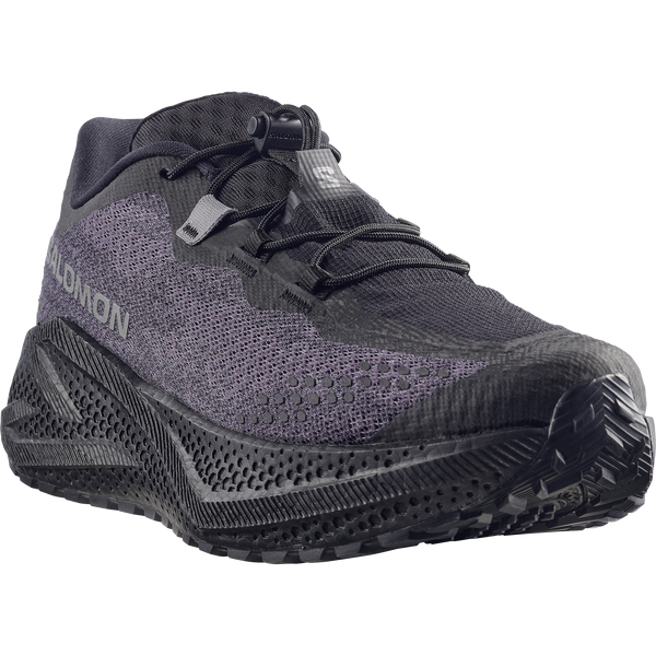 All black gravel running shoe on a white background