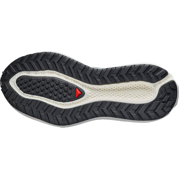 Teal and off-white gravel running shoe on a white background