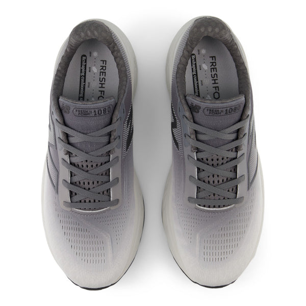 These Men's runnnig shoes from NB have an ombre look in grey where the heel area is the darkest.