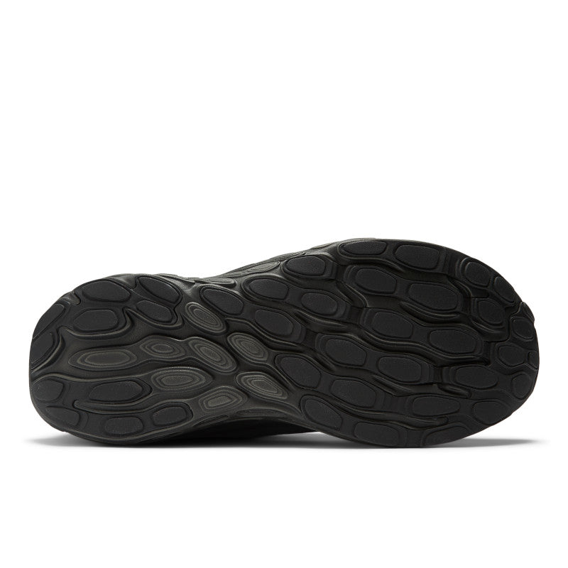 The out sole of this all black running shoe is also black