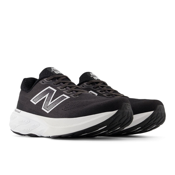 The upper of this NB shoe is mostly all black, while the midsole is white.