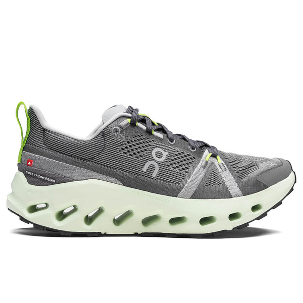 Gray running shoe with green accents on a white background