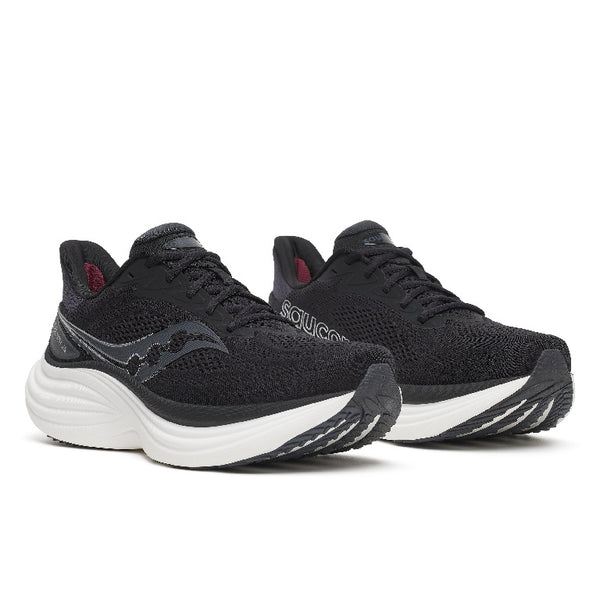 Black sneaker with white midsole on a white background