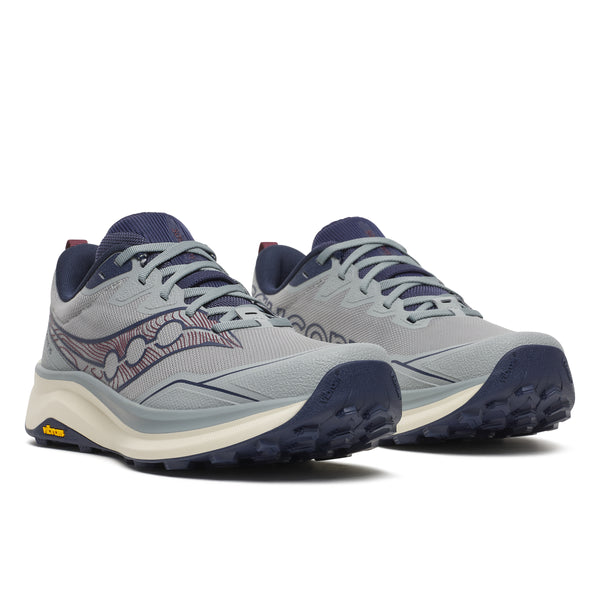 Pair of gray and navy running shoes on a white background