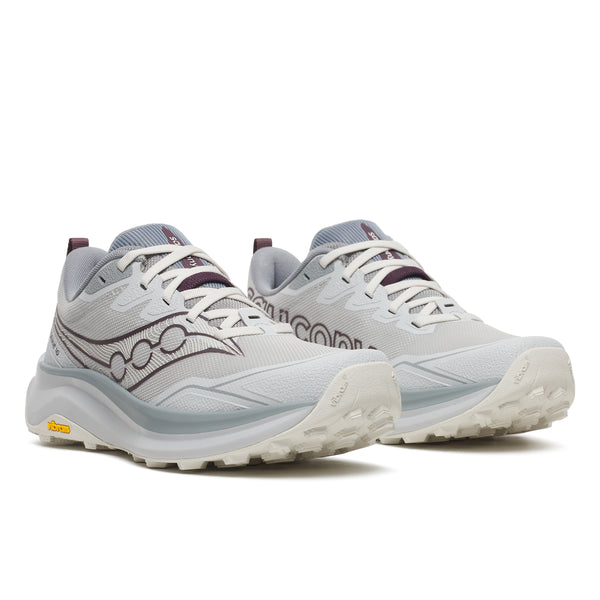 Pair of white running shoes with maroon accents on a white background