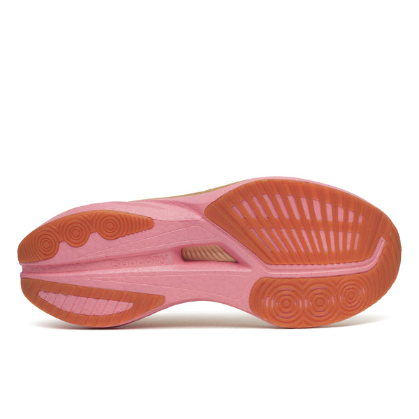 Pink athletic shoe on a white background