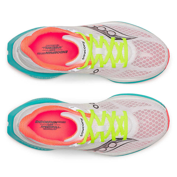 Top down view of a pair of mens running shoes with colorful sole and white background.