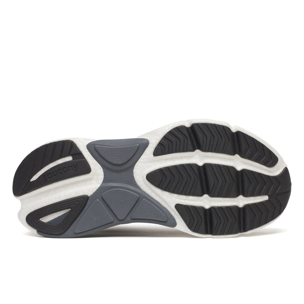 Black and white running shoes with Saucony logo on a white background