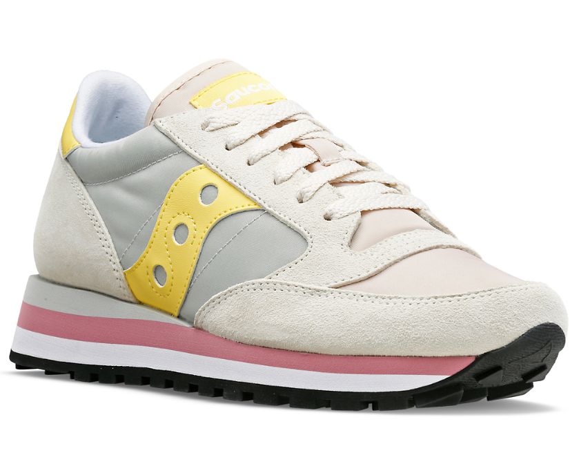 Front angle view of the Women's Jazz Triple by Saucony in Gray/Yellow