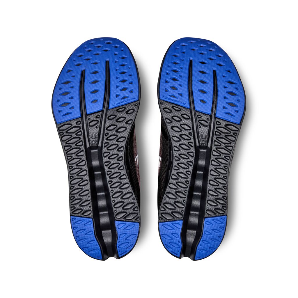 The outsole of this Cloudsurfer from On has a blue and black color