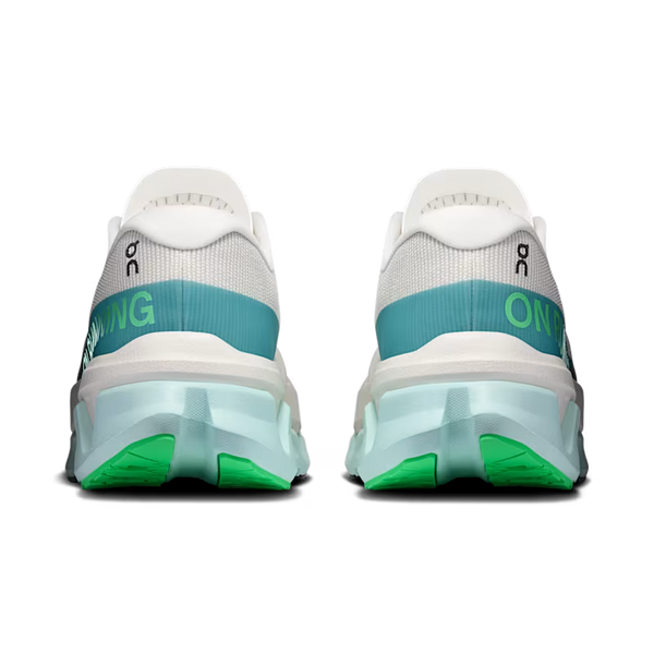 A pair of POC running shoes shown from the rear, featuring a white mesh upper, a teal midsole band, bright green outsole accents, and a translucent mint green and white chunky sole.
