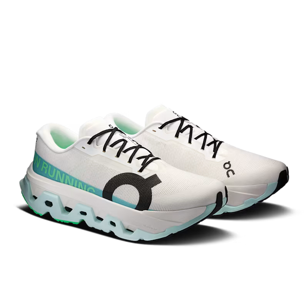 A pair of white On running shoes with black laces, a black circular logo, and mint green accents on the midsole and heel, shown against a plain white background.