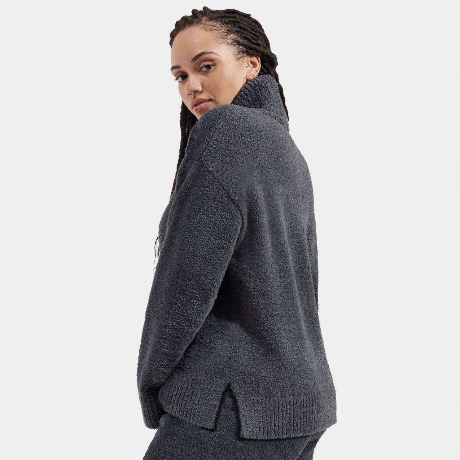 Back view of womens fleece turtleneck