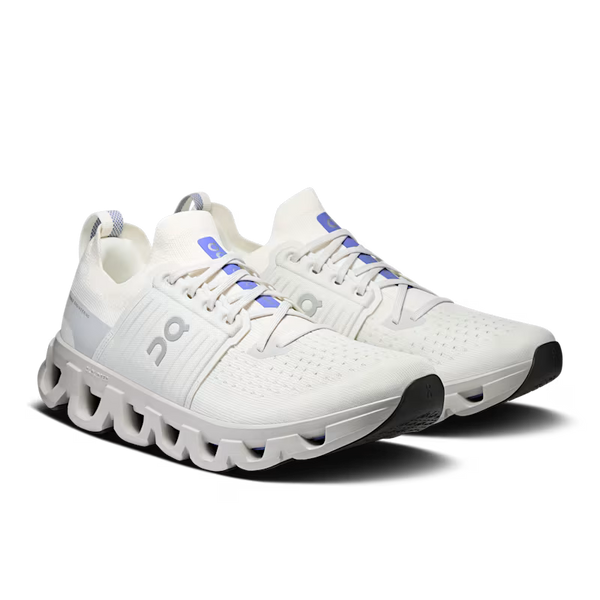 White running shoe with a unique sole design on a white background