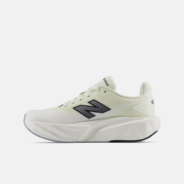 A Reebok athletic sneaker in off-white with a black and white 'N' logo on the side, shown in a side profile against a light gray background.