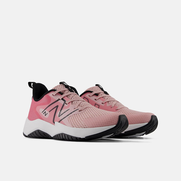 A pair of New Balance running shoes in pink and white with black accents, displayed against a light gray background.