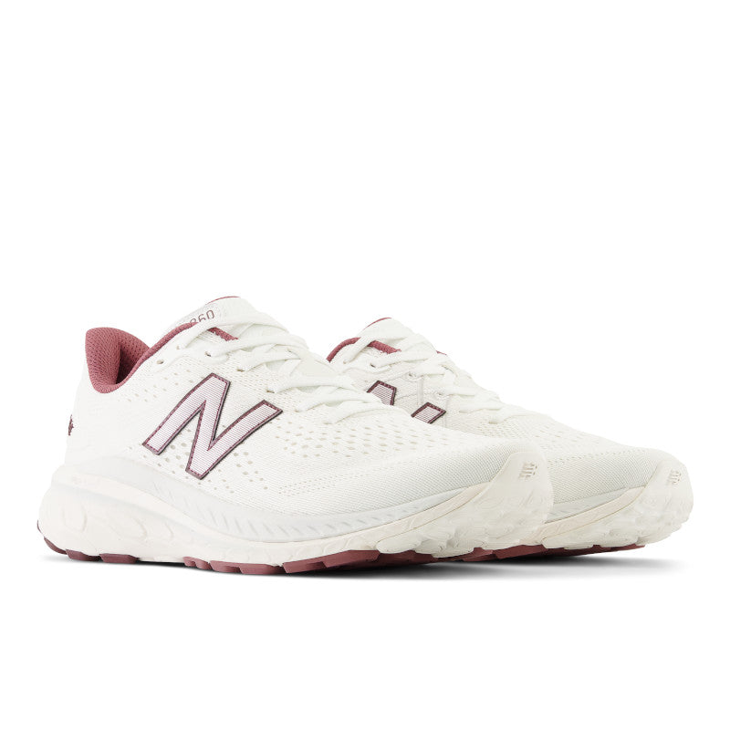 These are a fashionable pair of men's 860's due to the white upper and pop colors highlighting the logo adn arojnd the heel