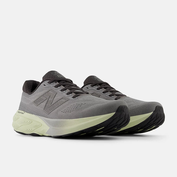 Gray running shoes with black accents on a white background