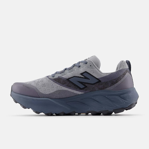 Gray and blue running shoe with New Balance logo on a white background