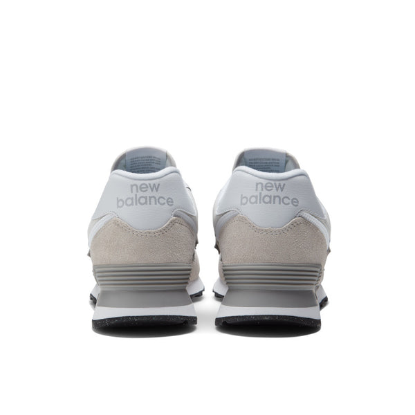 From behind the 574 the words new balance are written by the heel