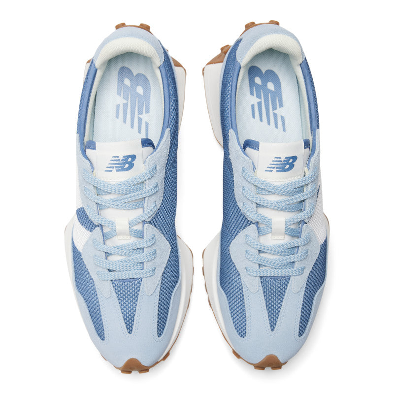 From the top down blue the design lines of the Men's 327 are more prevalent. This shoe also has light blue laces that match the shoes upper
