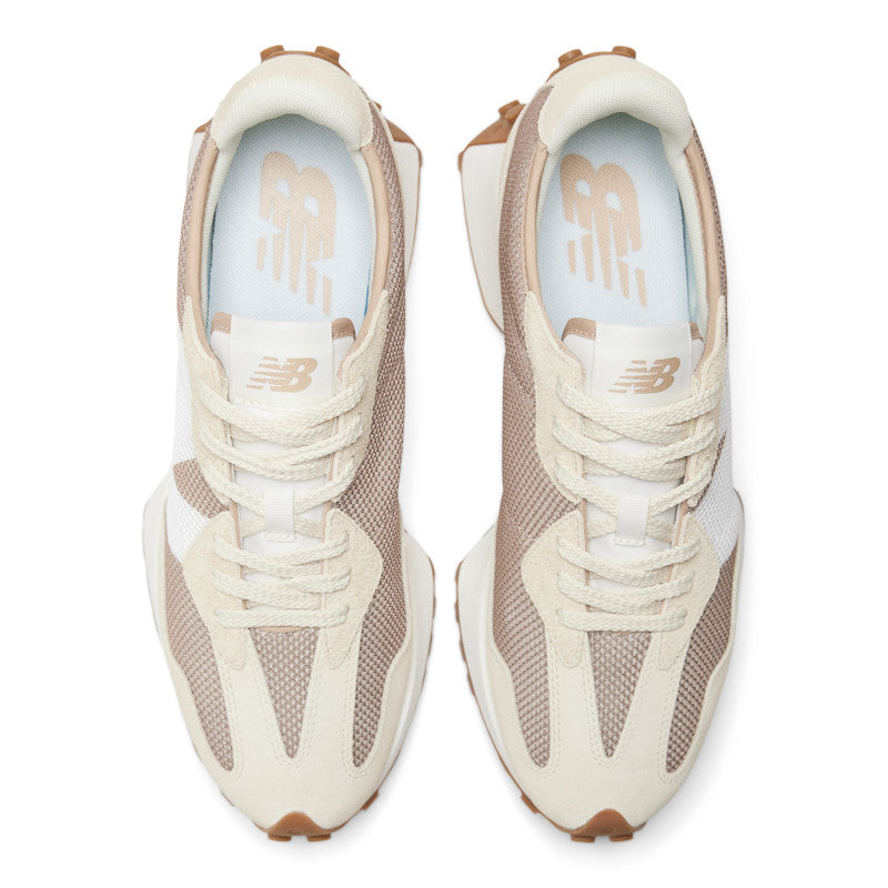 From the top view, the upper features lightweight materials and is highlighted by a bold, oversized N logo that exaggerates a signature New Balance heritage aesthetic.