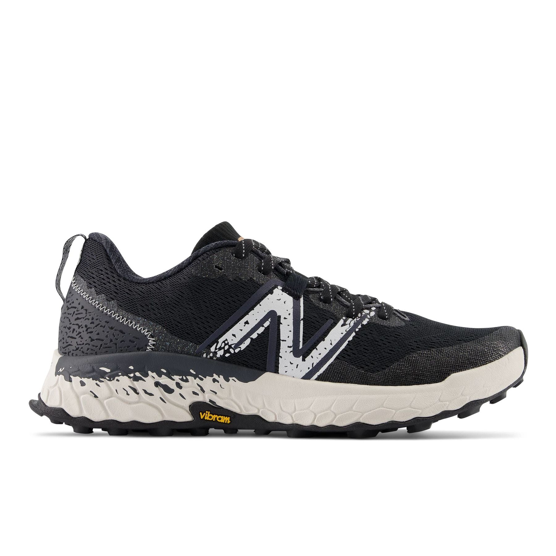 Lateral view of the Men's Hierro V7 trail shoe by New Balance in the color Black/Reflection