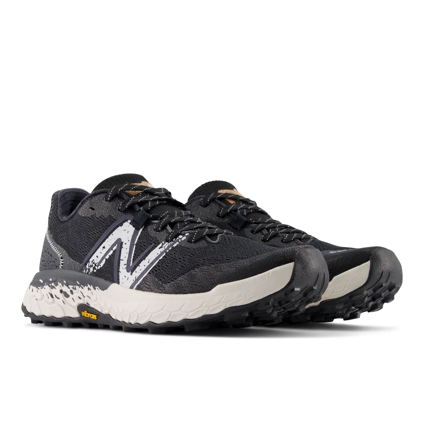 Front angle view of the Men's Hierro V7 trail shoe by New Balance in the color Black/Reflection