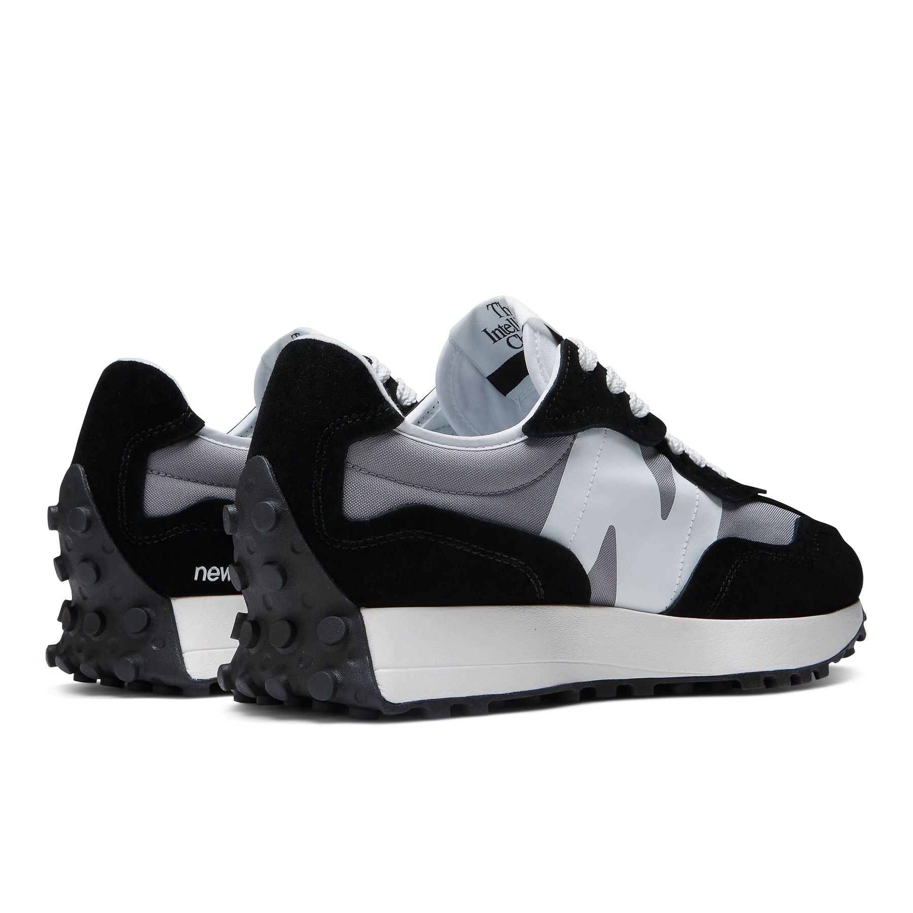 Back angled view of the Men's New Balance 327 lifestyle shoe in Black/Grey